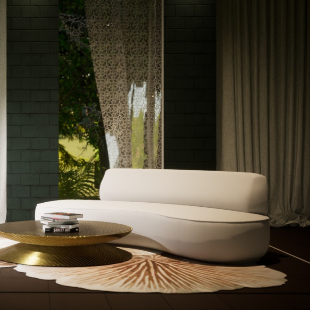 Modern curved ivory sofa in a stylish living room with gold coffee table and patterned rug