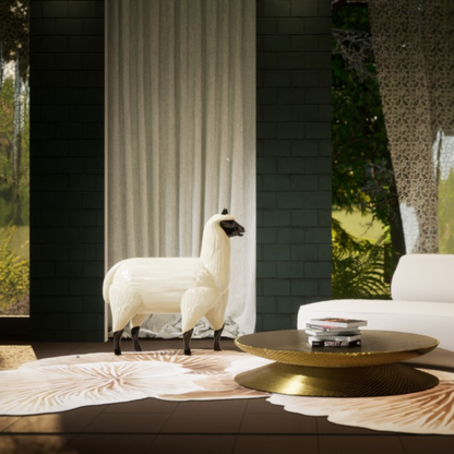 Unique white alpaca seating chair in modern living room with gold coffee table and rug