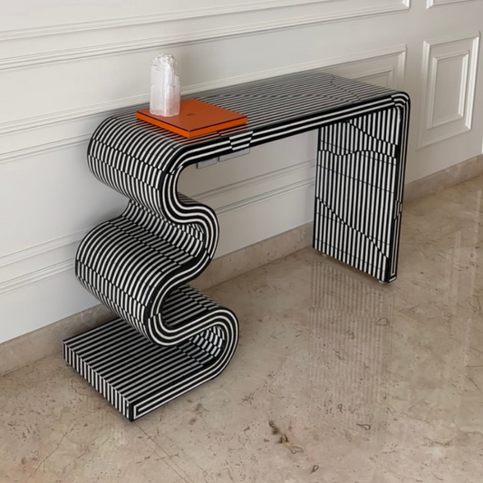 Monochrome twist table with black and white striped curved design and modern style