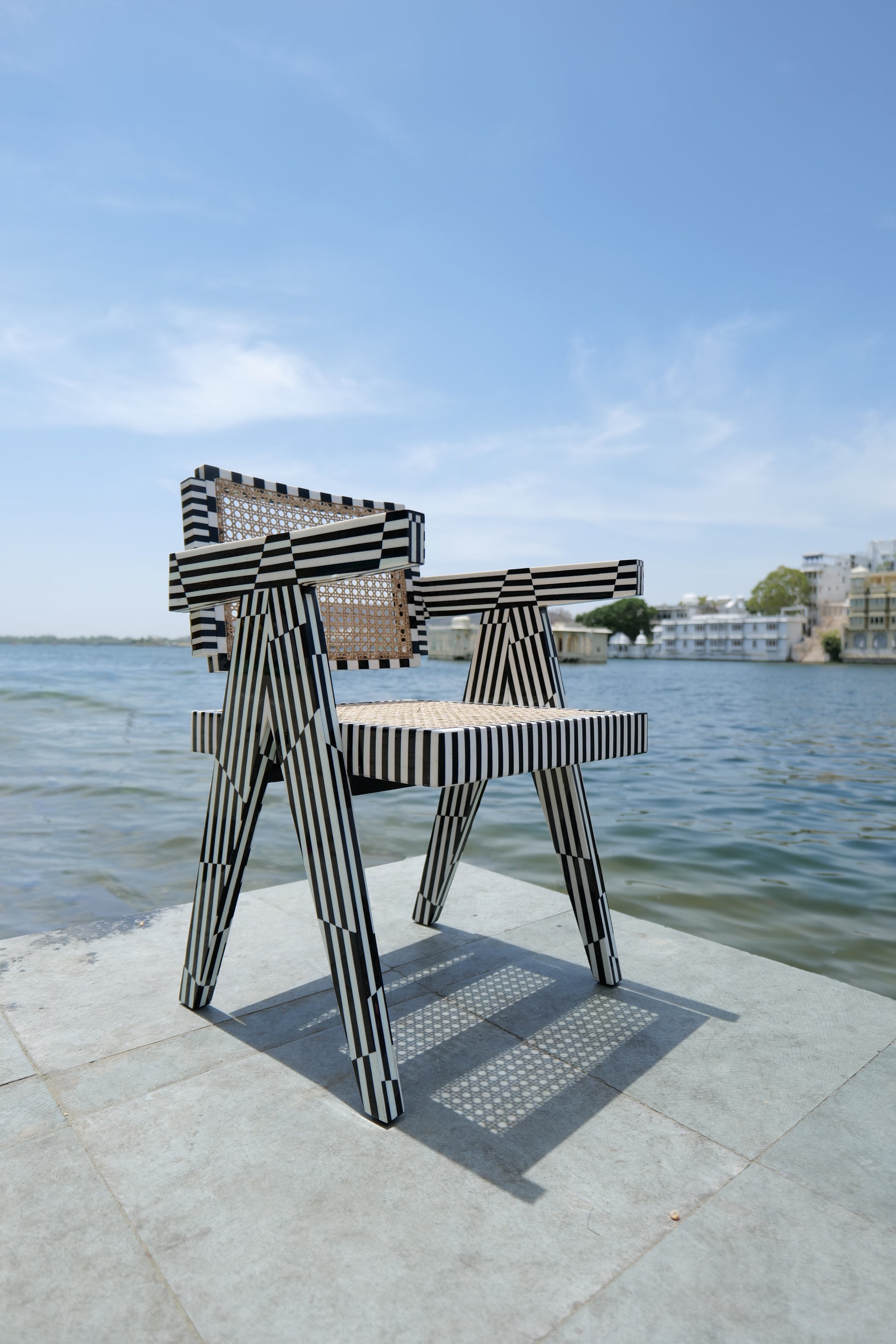 Pierre on the Piano Chair, artisan furniture with monochromatic aesthetic, striped design 