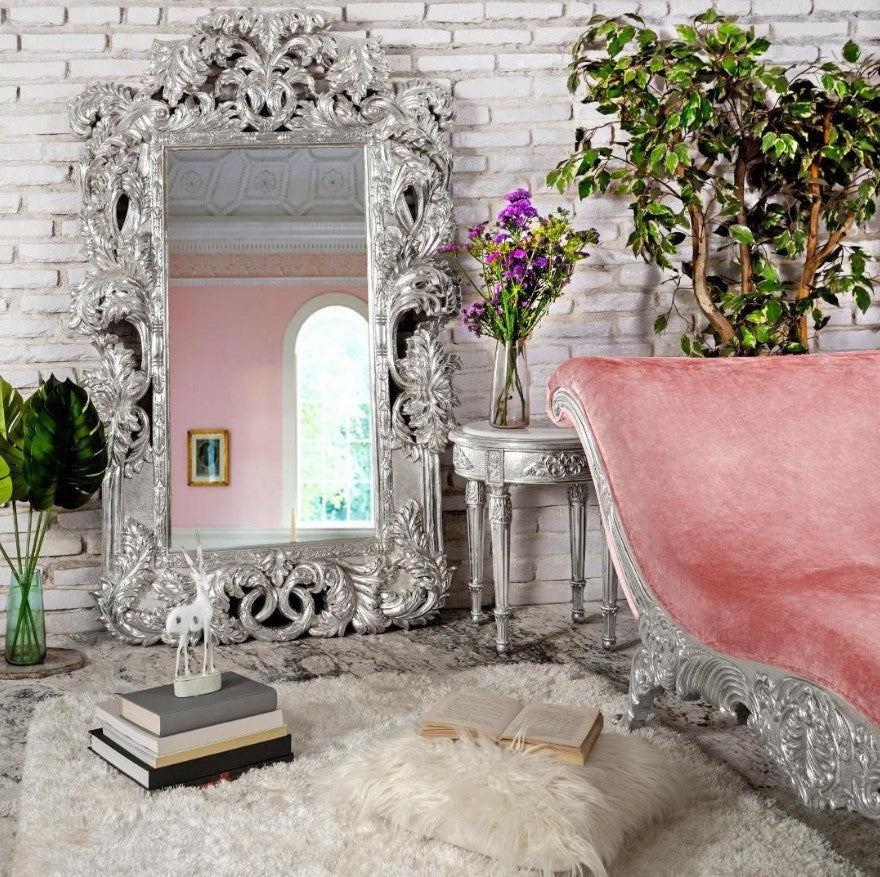 Khenshu Sea Salt Chaise in a stylish living room with elegant decor and large mirror