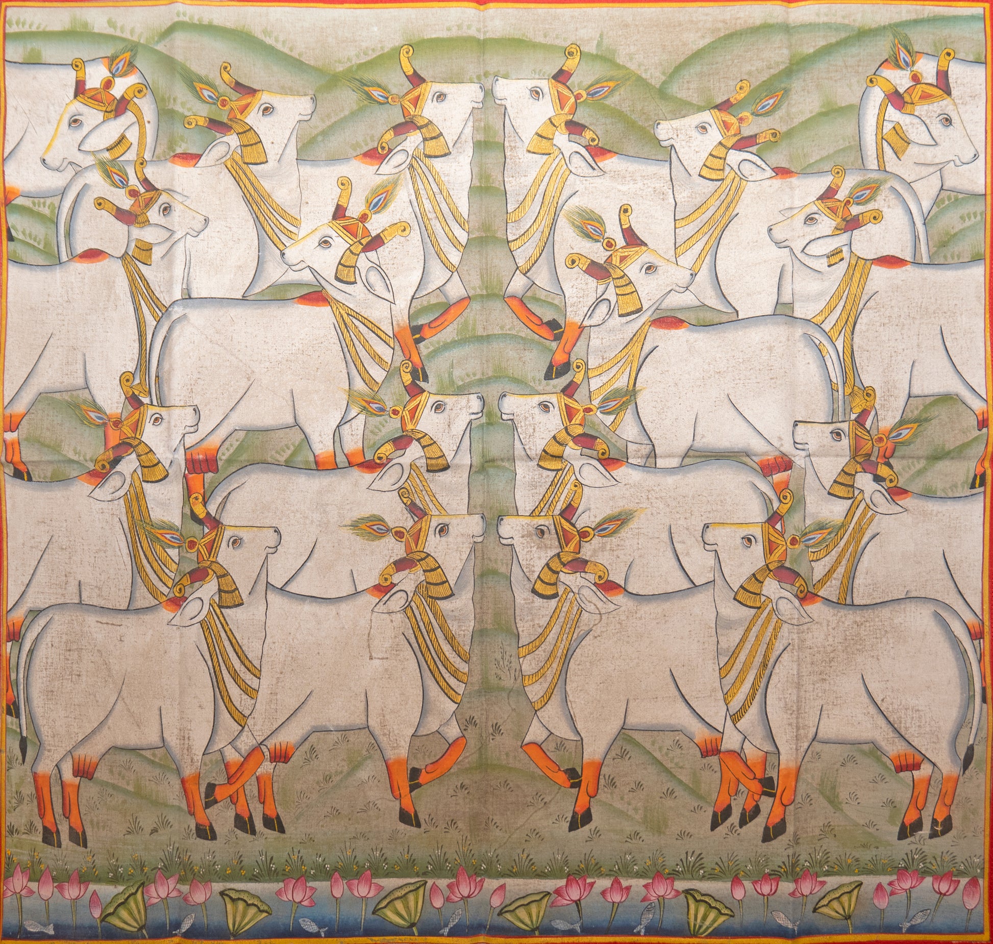 The summer meadow Pichwai Painting showing symmetrical white cows in a pastoral scene with lotus border and green hills
